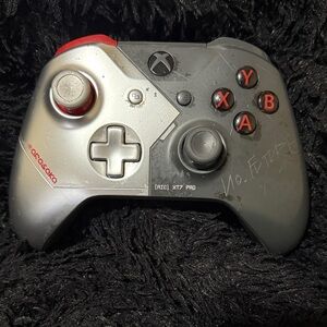 Red and Silver Gaming Controller by
